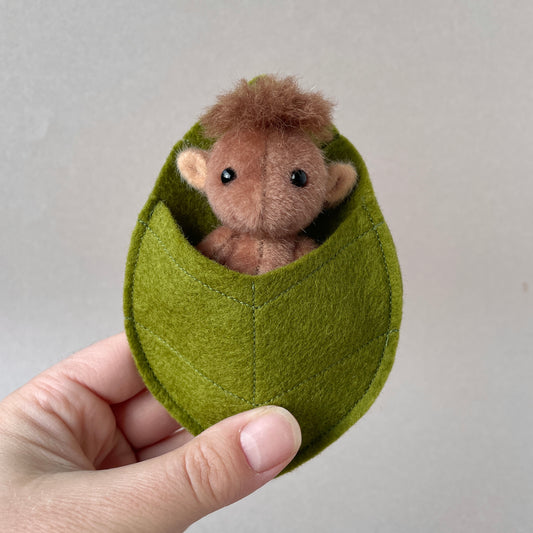 Brown baby goblin with leaf pouch