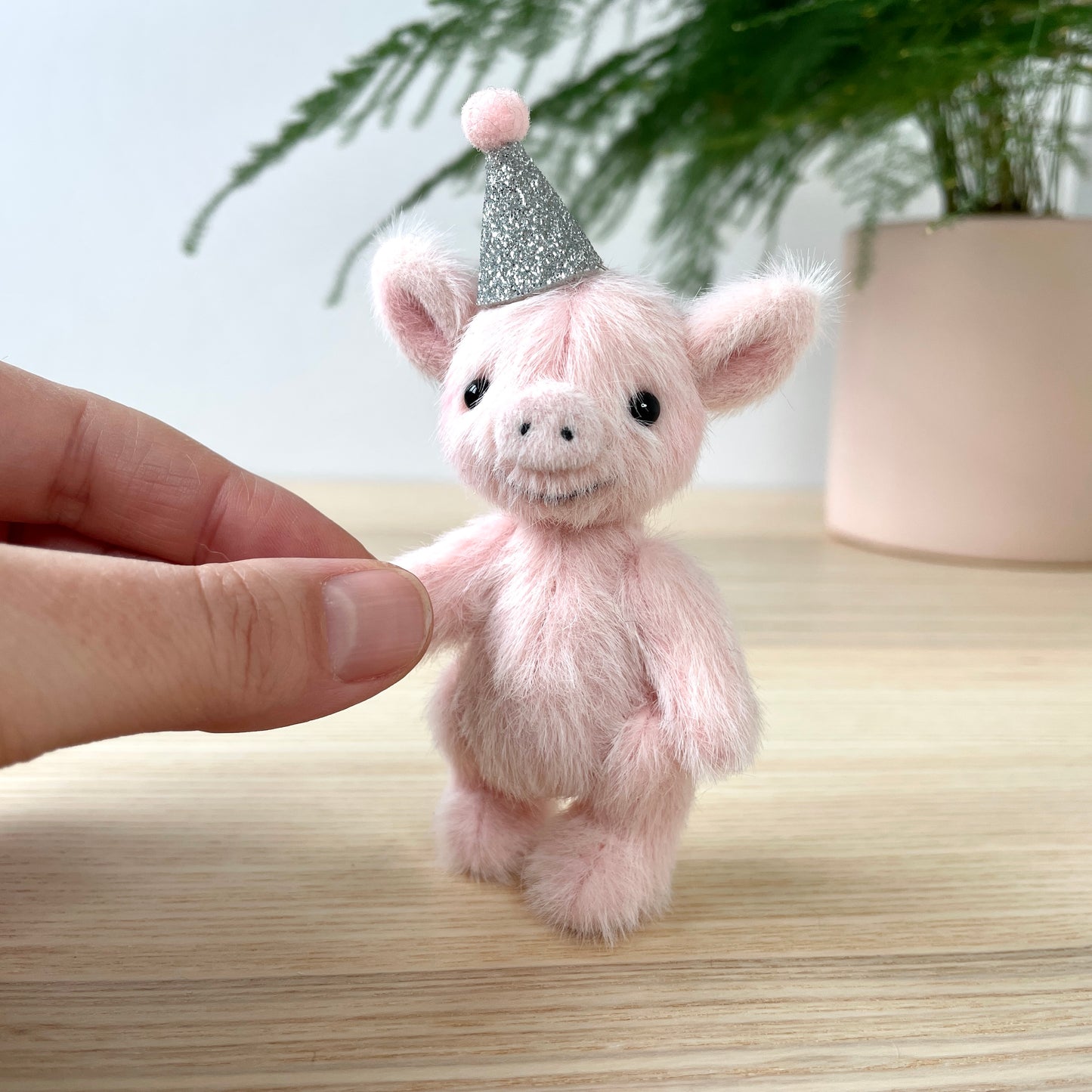 Party piglet with a silver party hat