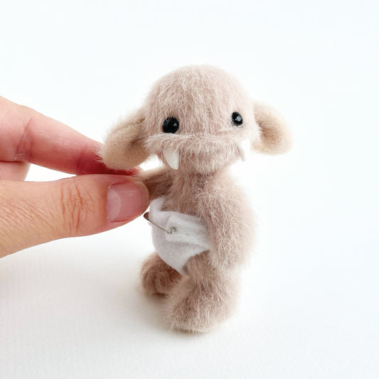 Baby monster teddy - light beige