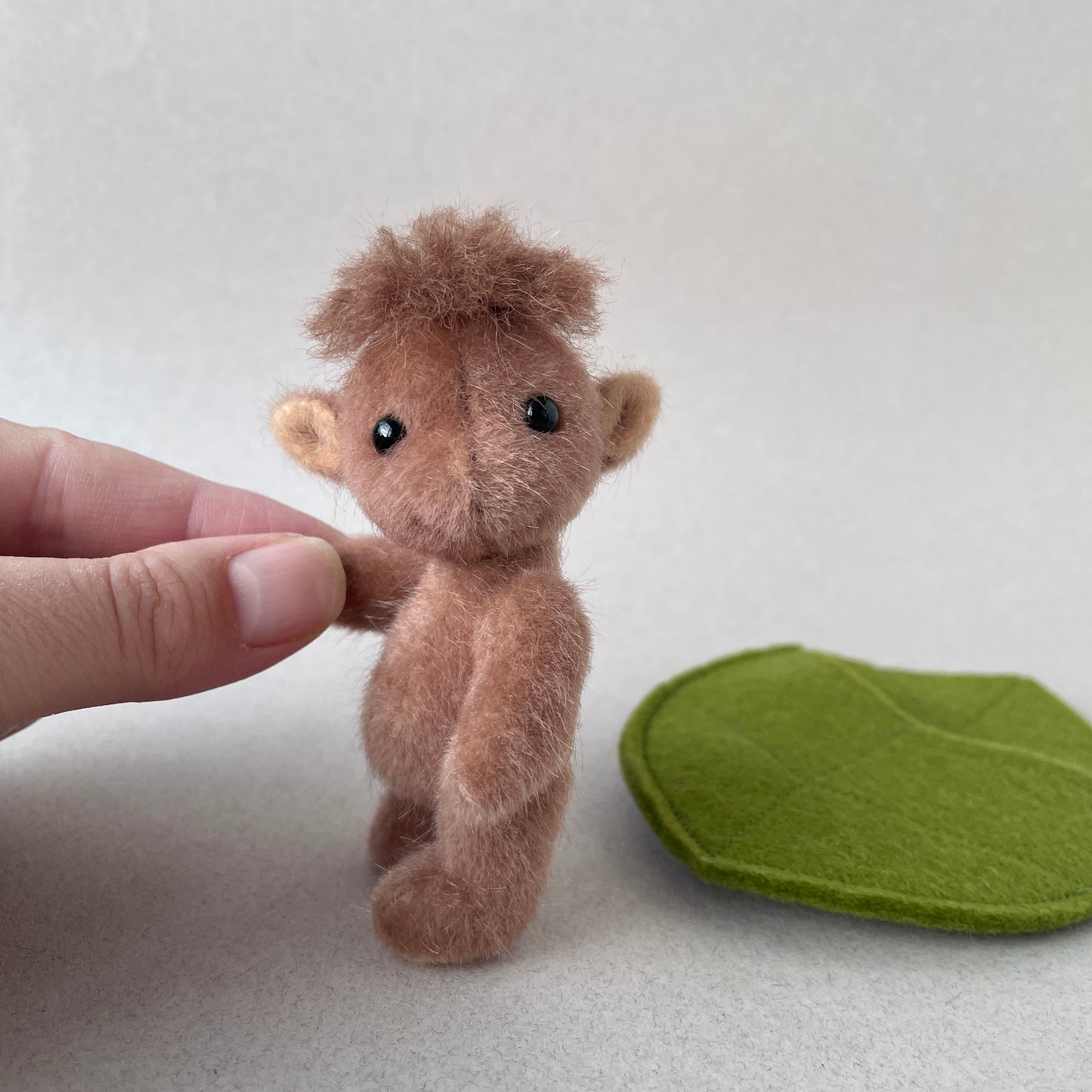 Brown baby goblin with leaf pouch