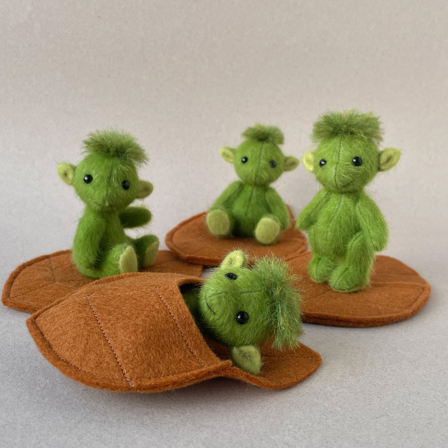 Green baby goblin with leaf pouch
